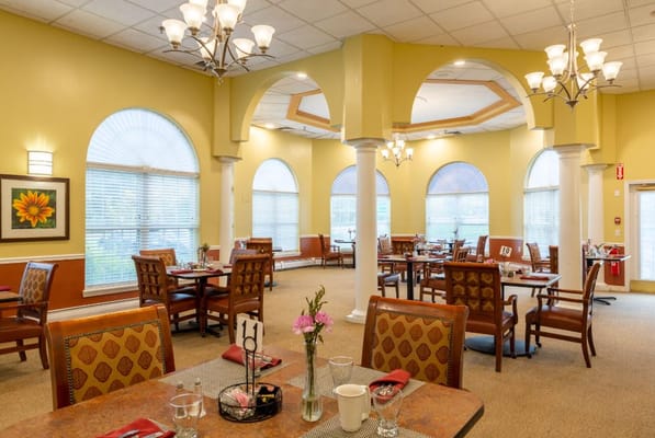 Dining area with tables and decorative lighting