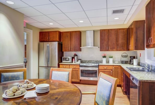 Bright kitchen area with snacks and modern appliances