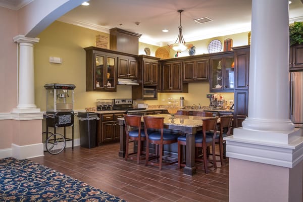 Interior kitchen area with seating and appliances