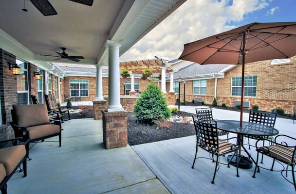 Outdoor seating area with table and chairs