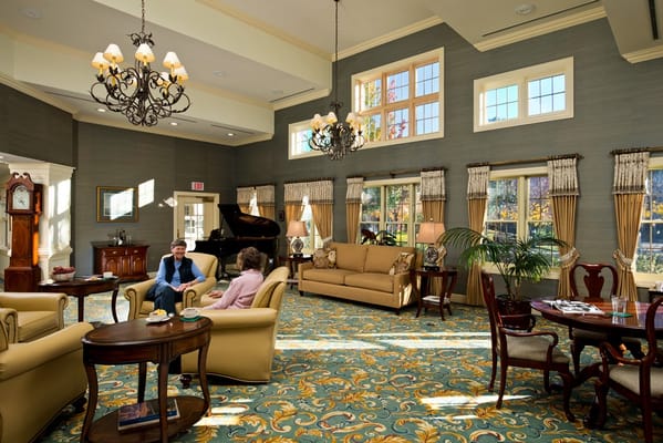 Residents socializing in a bright common area