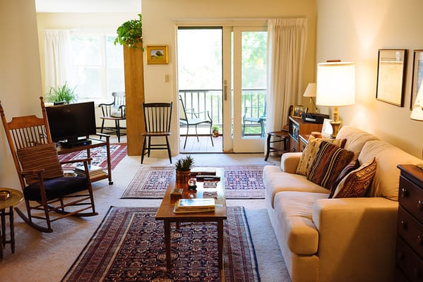 Cozy interior living space with seating and natural light