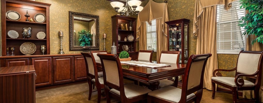 Elegant dining room with wooden furniture and decor