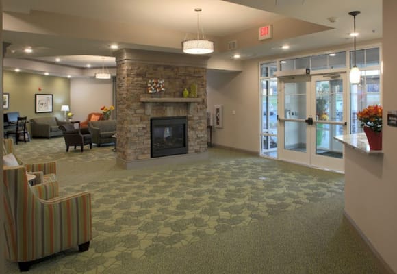 Interior view of a cozy common area with seating