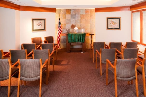 Interior view of a small meeting room with chairs