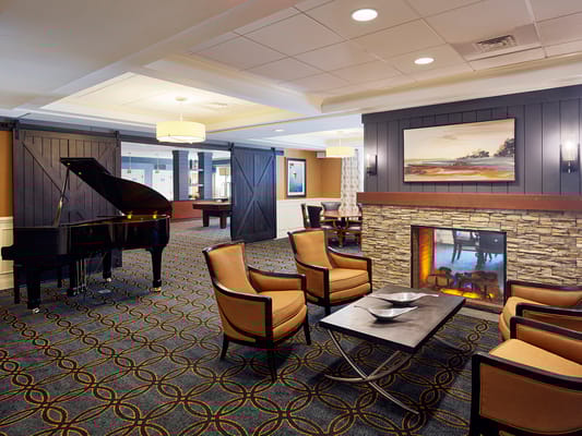 Cozy common area with seating and fireplace