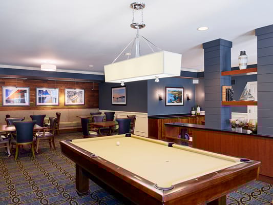 Interior common area with pool table and seating