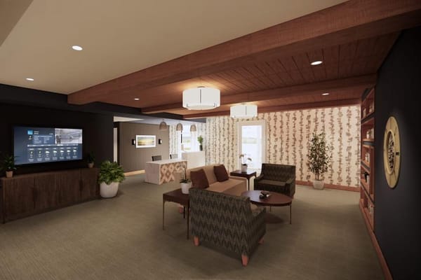 Cozy common area with comfortable seating and a TV