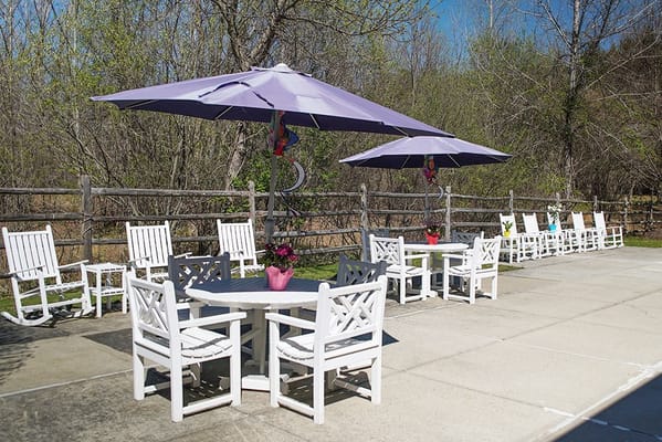 Outdoor patio with seating and umbrellas