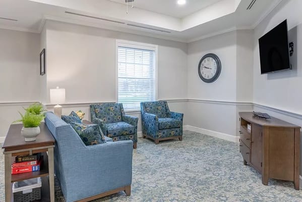 Bright common area with seating and decor