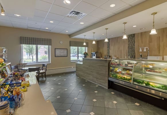 Interior of a dining area with a food display
