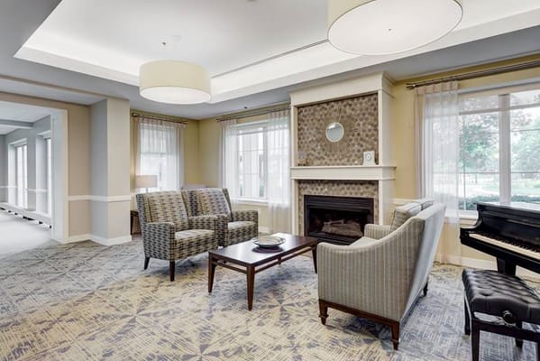 Cozy common area with seating and fireplace