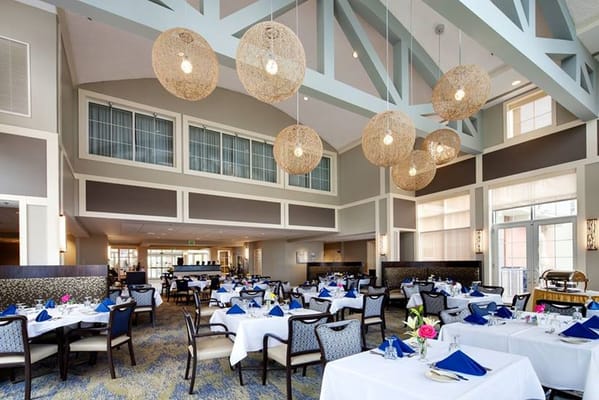 Bright dining room with elegant table settings