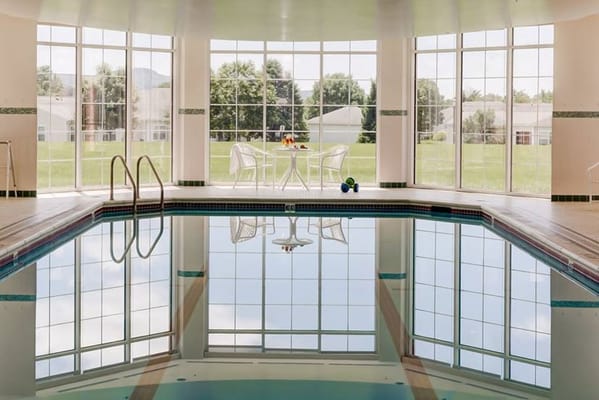 Indoor swimming pool with large windows