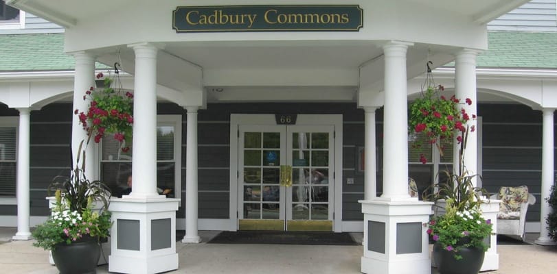Front entrance of Cadbury Commons with flowers