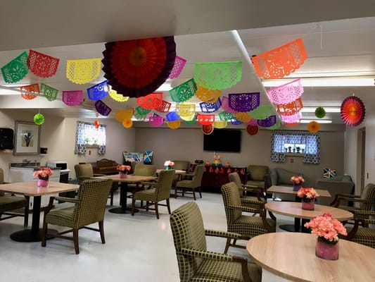 Decorated common area with colorful paper banners