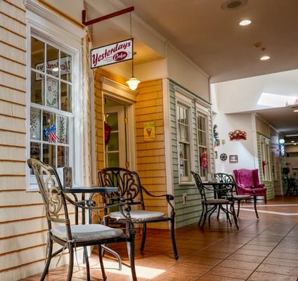 Bright corridor with seating and café signs