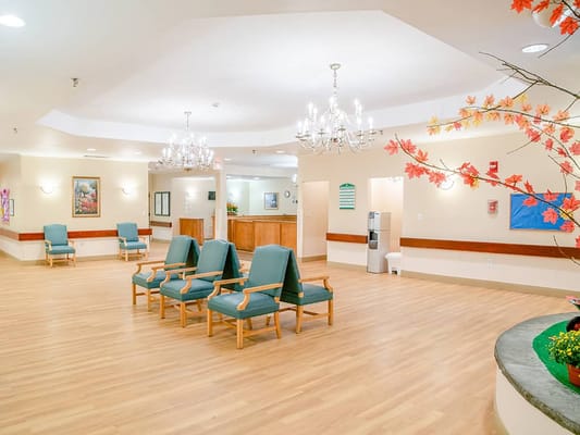 Bright interior common area with seating and decor