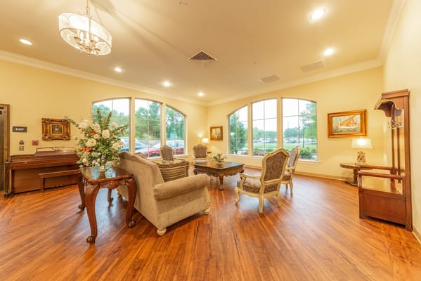 Cozy lobby area with elegant furniture and large windows