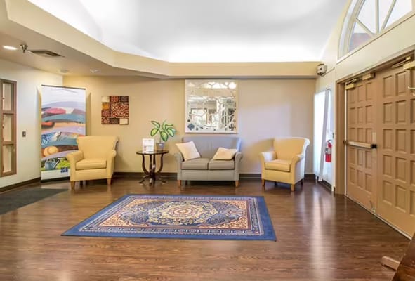 Bright, welcoming lobby with seating and decor