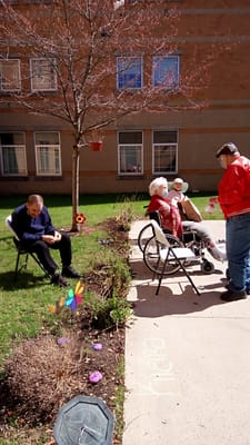 Residents enjoying a sunny day in the garden