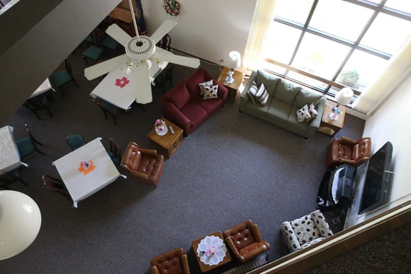 View of a common area with seating and tables