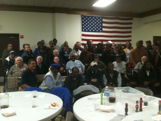 Residents and staff gathered in a common area