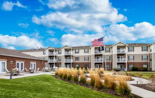 Exterior view of Connect55+ La Vista with gardens