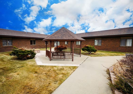 Outdoor gazebo in a landscaped courtyard