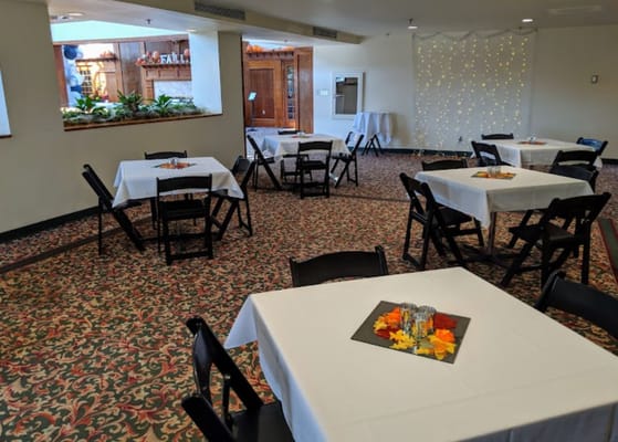 Interior view of a dining area with tables and decor