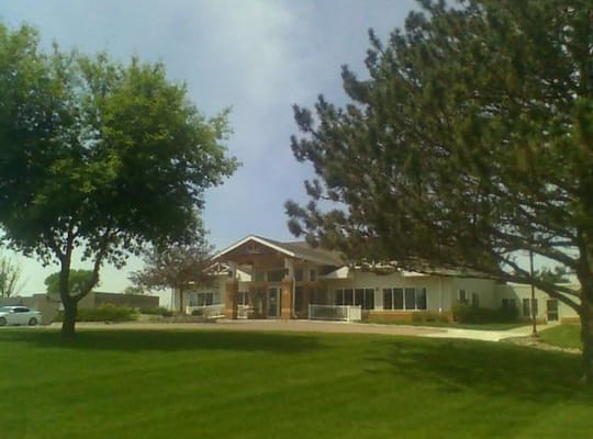 Exterior view of Countryside Health Care Center surrounded by trees