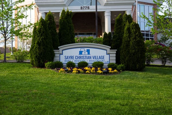 Exterior view of Sayre Christian Village with well-maintained landscaping