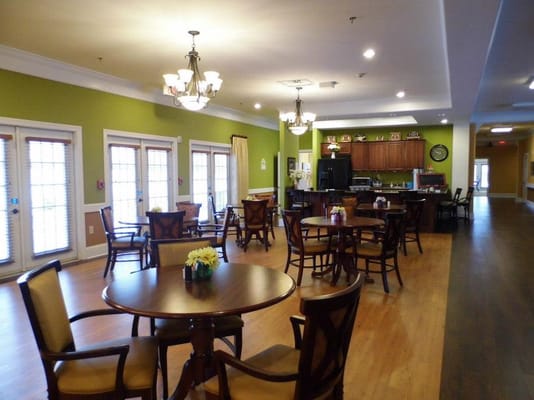 Interior of a common area with tables and chairs