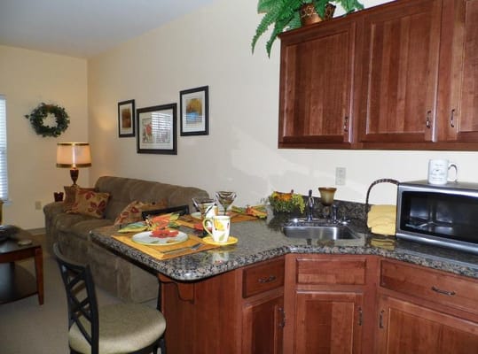 Cozy kitchen area with dining setup and decor