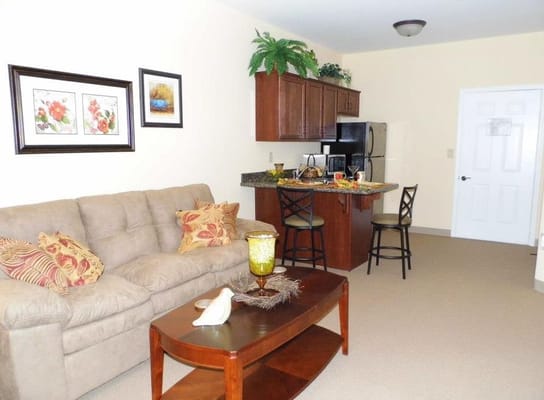 Cozy indoor living space with kitchen and seating area