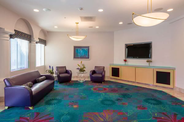 Cozy common area with seating and colorful decor