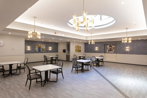 Bright dining room with tables and chairs