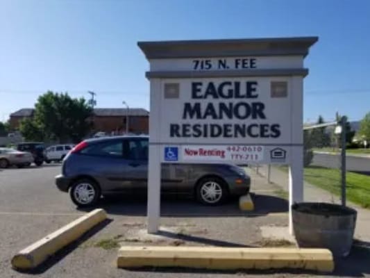 Signage for Eagle Manor Residences with facility name