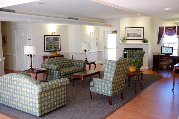 Interior view of a common area with chairs and tables
