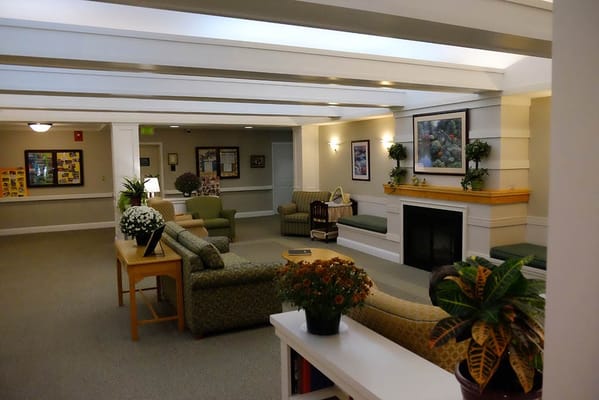 Common area with comfortable seating and plants