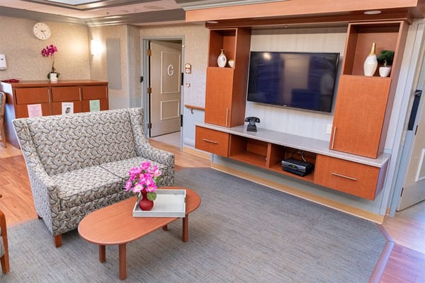 Common area with sofa and television