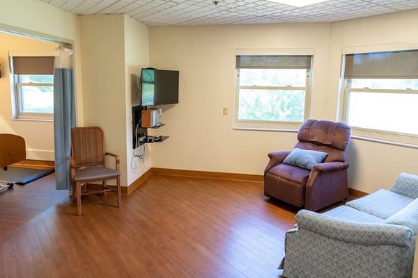 Interior view of a resident room with furniture