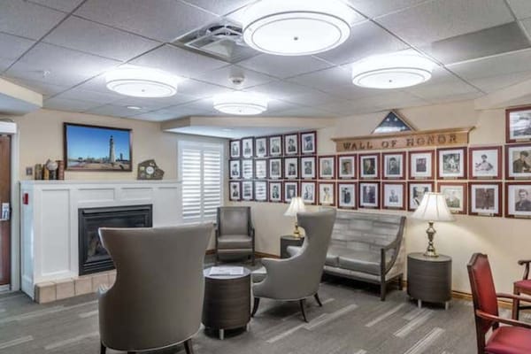 Common area with seating and a 'Wall of Honor'