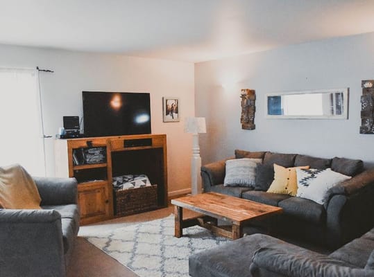 Cozy common area with sofas and decor