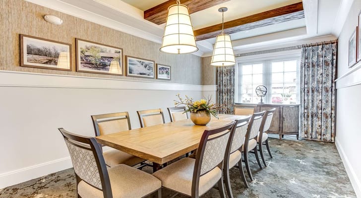 Bright dining room with wooden table and chairs