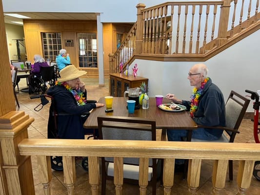 Residents enjoying a meal in a common area