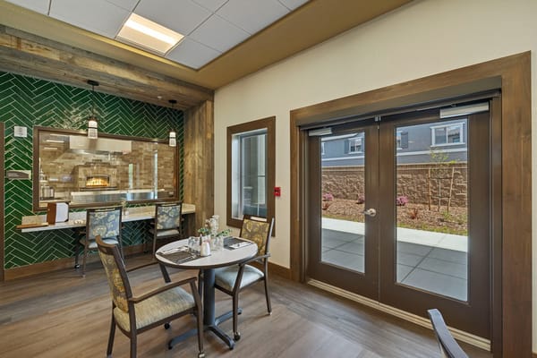 Dining area with a table and outdoor view