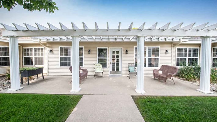 Outdoor patio area with seating at Floyd Senior Living