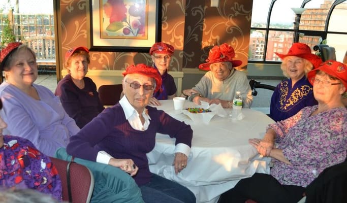Residents enjoying a social gathering in the common area