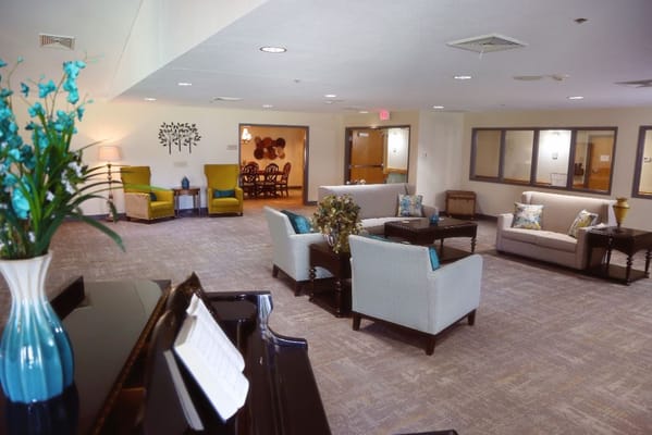 Spacious living room with seating and decorative elements